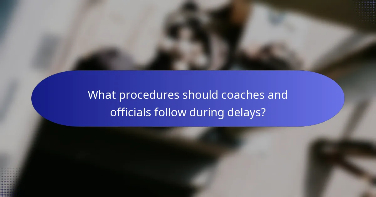 What procedures should coaches and officials follow during delays?